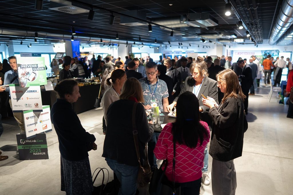 Networking dans l'espace partenaires du Symposium 2025 Namur